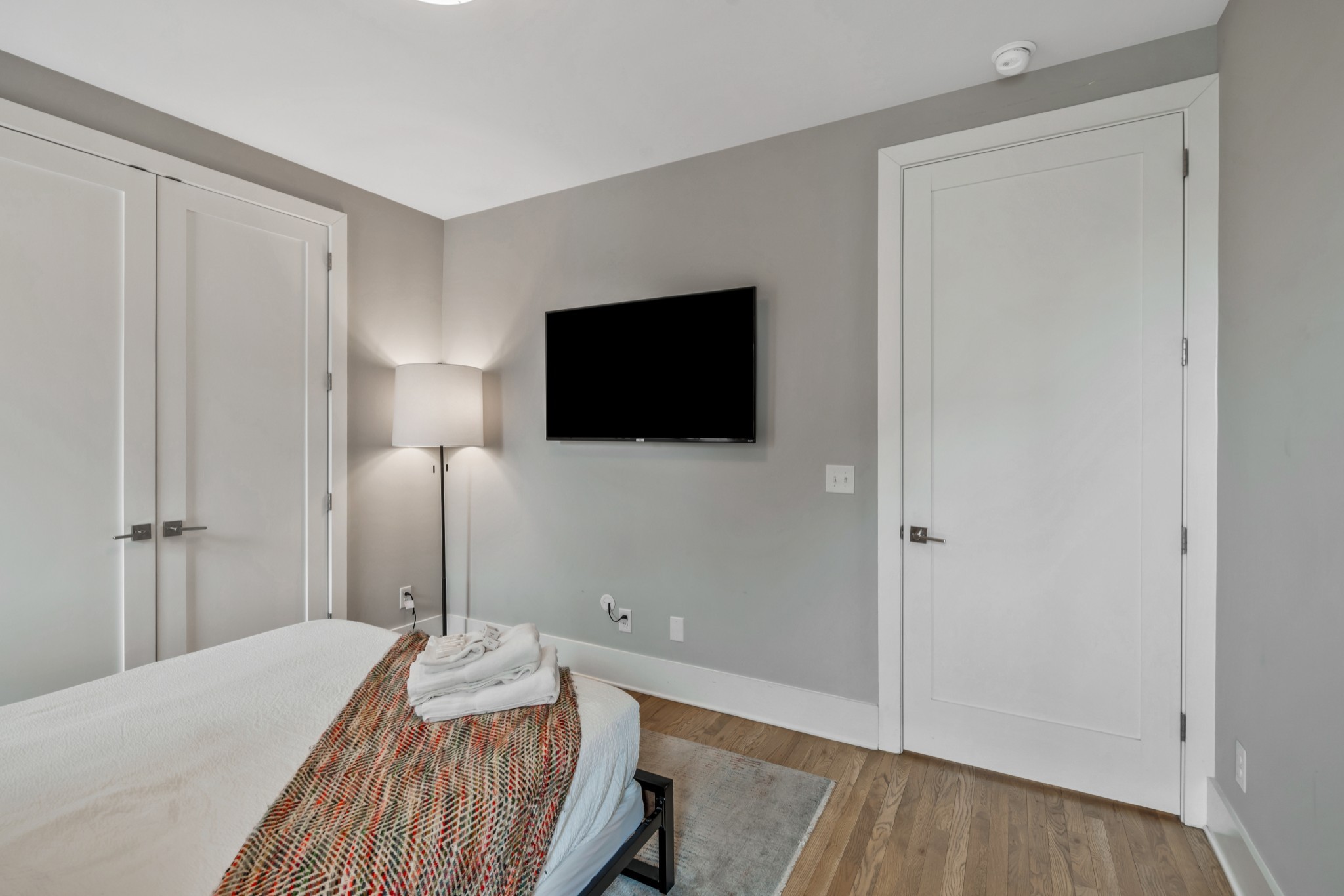 705 27th Avenue North Nashville, TN 37209 - Photo 10 of 41 a bedroom with a bed and a flat screen tv