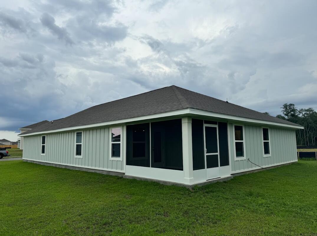 537 Mary Lou Way Crestview, FL 32539 - Photo 2 of 10 a big house with a big yard and large trees