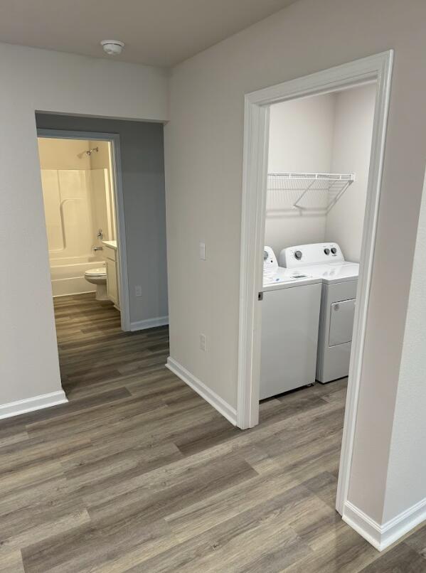 537 Mary Lou Way Crestview, FL 32539 - Photo 3 of 10 a view of utility room with wooden floor washer and dryer