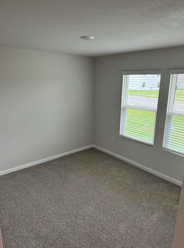 537 Mary Lou Way Crestview, FL 32539 - Photo 5 of 10 an empty room with a window