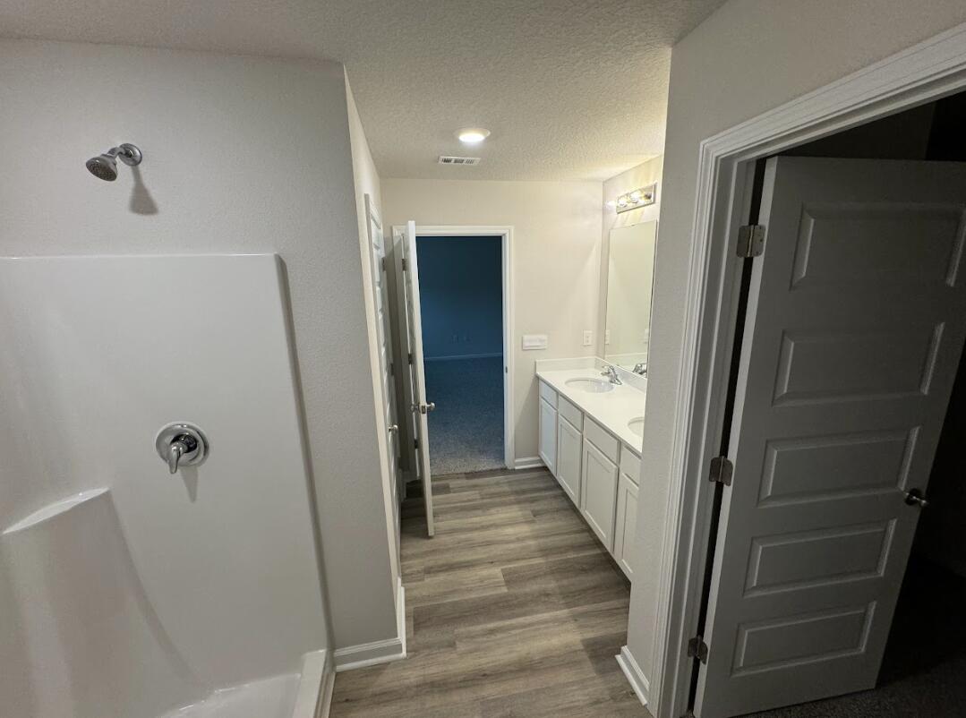 537 Mary Lou Way Crestview, FL 32539 - Photo 10 of 10 a bathroom with a sink a toilet and shower