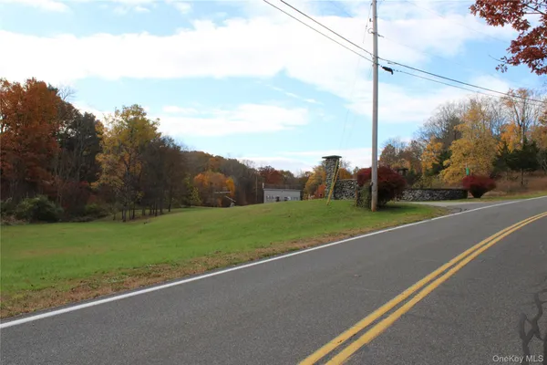 a view of a field with a big yard