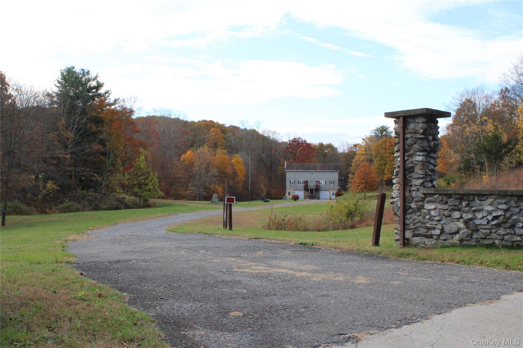 400 Round Lake Road Rhinebeck, NY 12572 - Photo 4 of 34 View of asphalt driveway with a view of trees