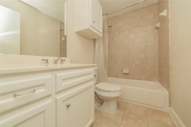 a bathroom with a sink a toilet and a bathtub