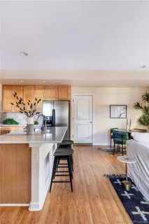 a view of a living room and dining room