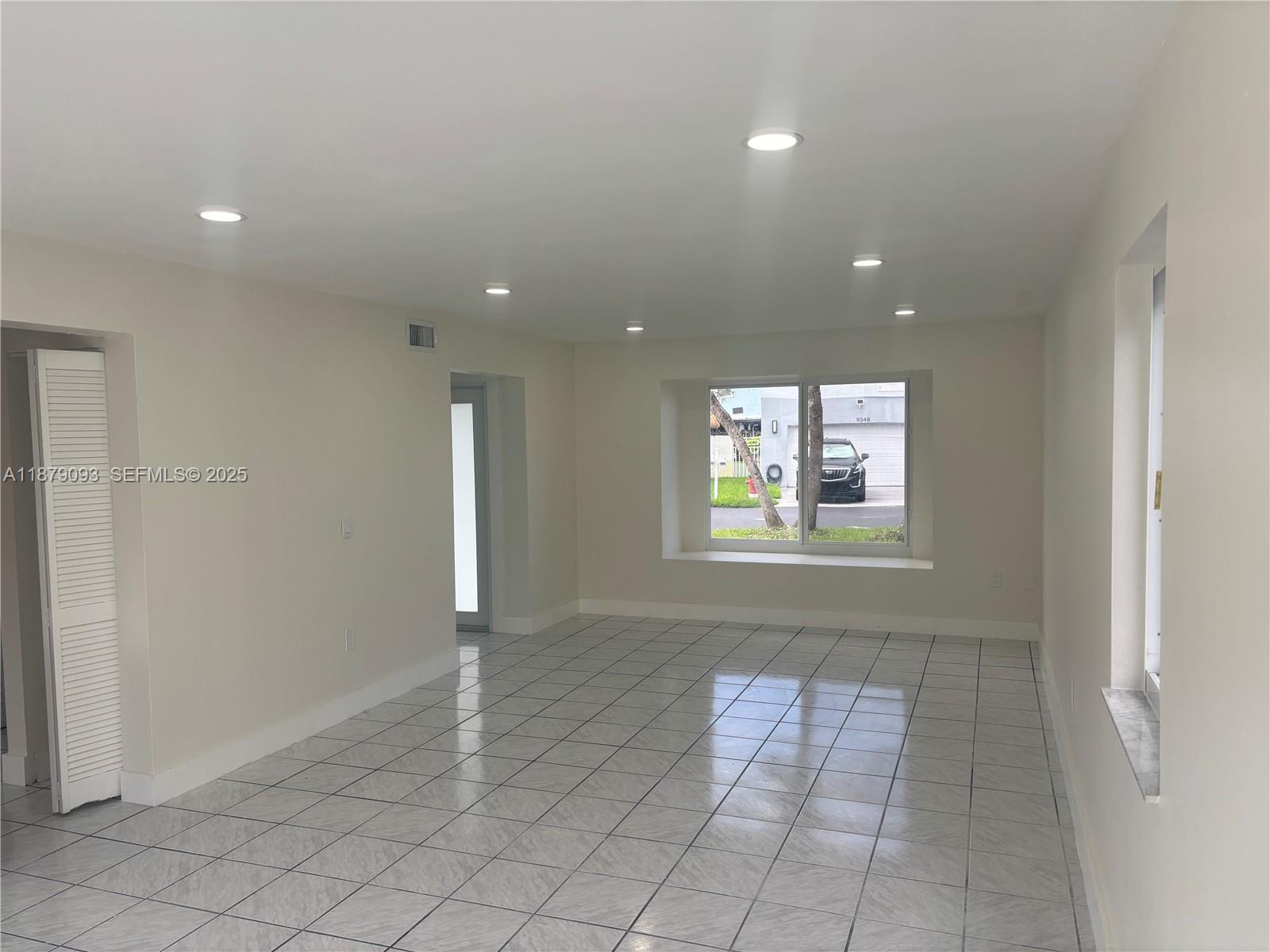 9435 Southwest 144th Court Miami, FL 33186 - Photo 6 of 32 Living Room/ Dining Room