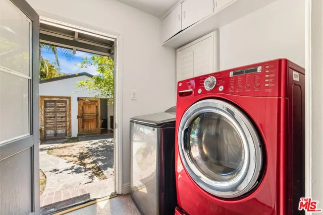 a view of washer and dryer in a utility room