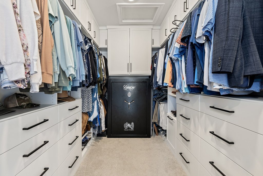 365 Pear Tree Lane Austin, TX 78737 - Photo 23 of 39 a view of walk in closet with clothes and shoes