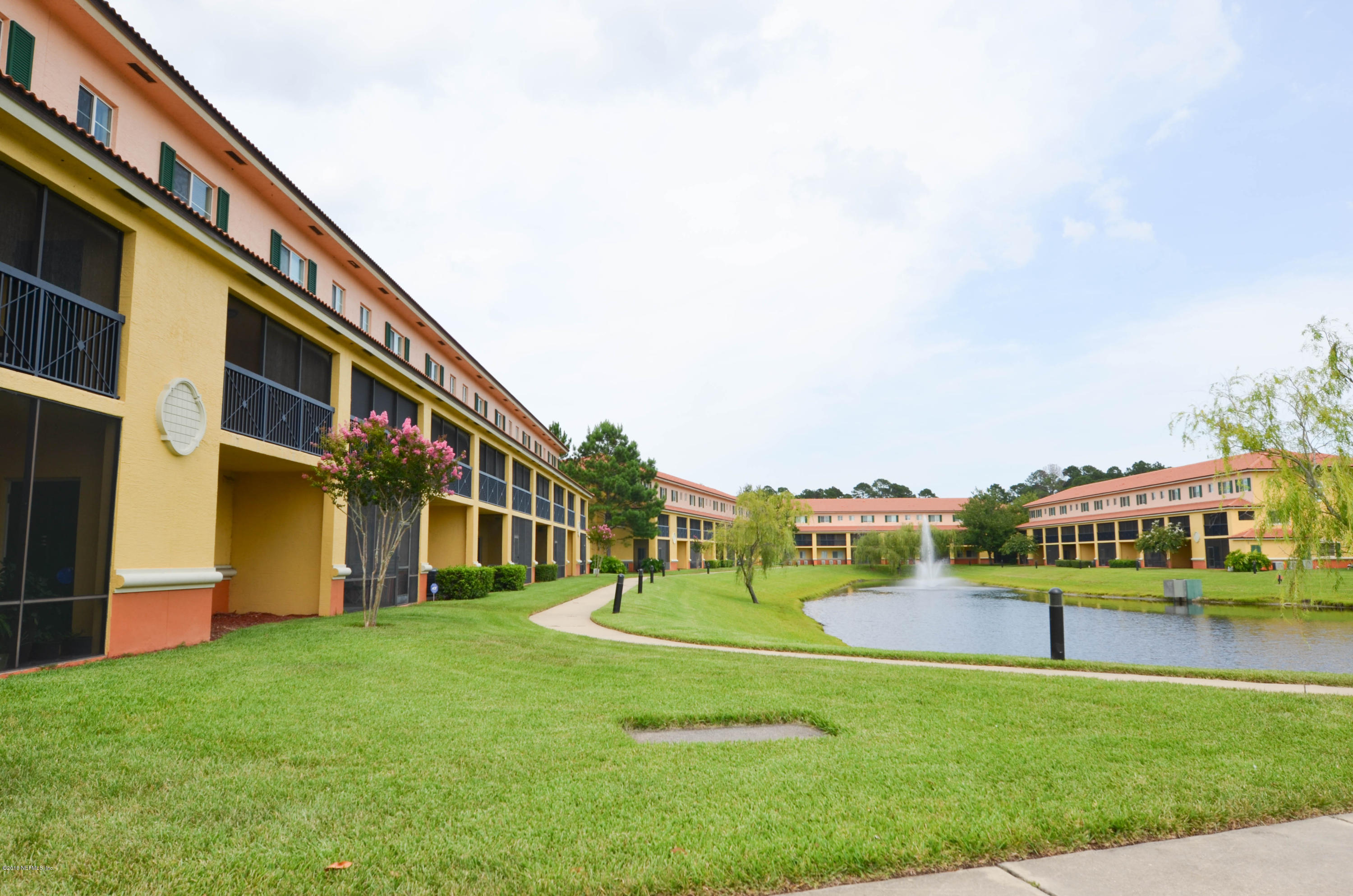 9745 Touchton Road, Unit 1829 Jacksonville, FL 32246 - Photo 23 of 37 a view of building with outdoor space