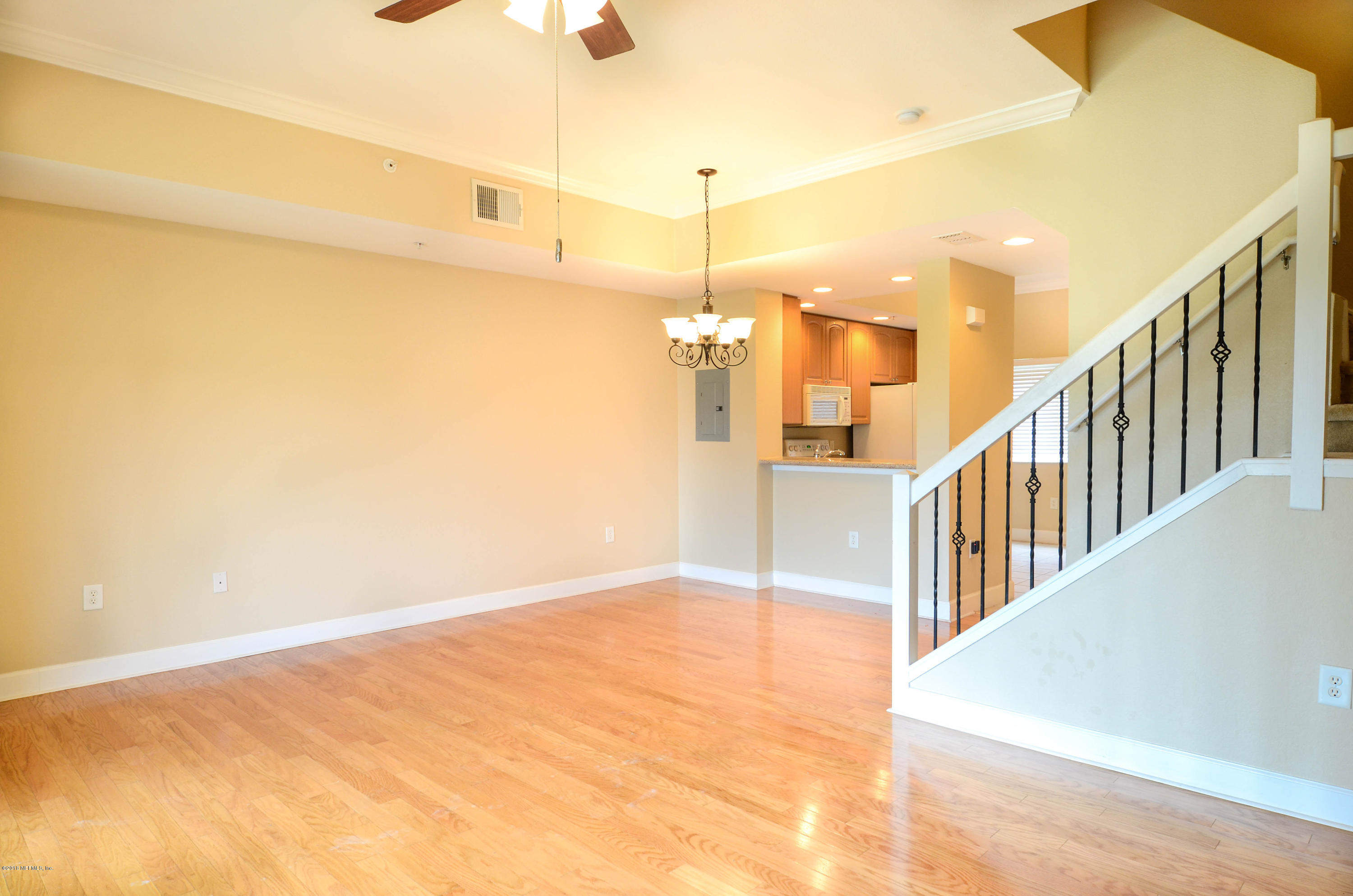 9745 Touchton Road, Unit 1829 Jacksonville, FL 32246 - Photo 8 of 37 a view of a hallway with wooden floor