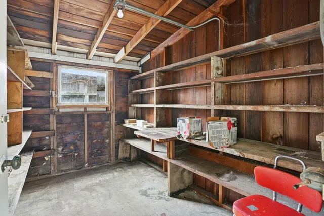 a view of a building with sitting area