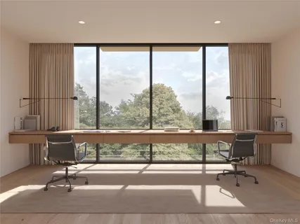 a living room with a large window and table