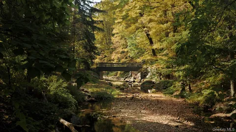 a blue sign that is on the side of the road