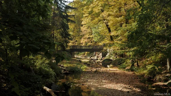 a blue sign that is on the side of the road