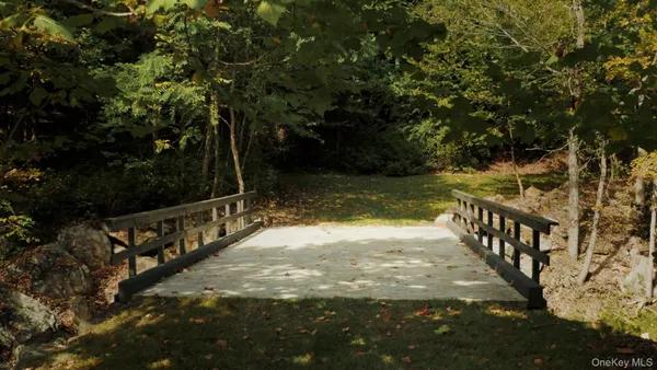 a front view of a house with garden and porch