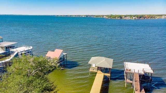 6209 Point La Vista Road Malakoff, TX 75148 - Photo 1 of 38 a backyard of a house with lots of green space and fog
