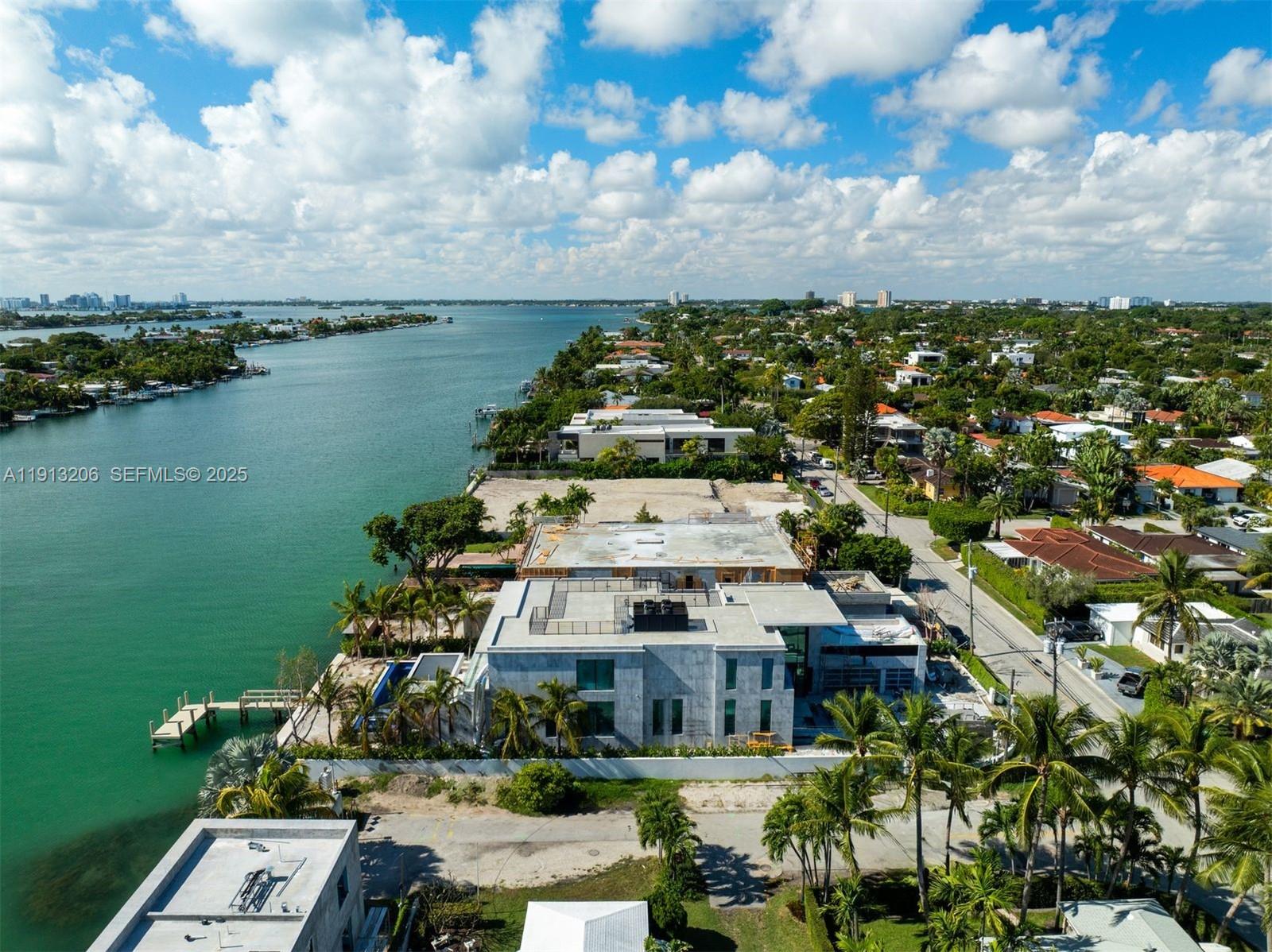 600 88th Street Surfside, FL 33154 - Photo 25 of 27 a view of a lake with a city