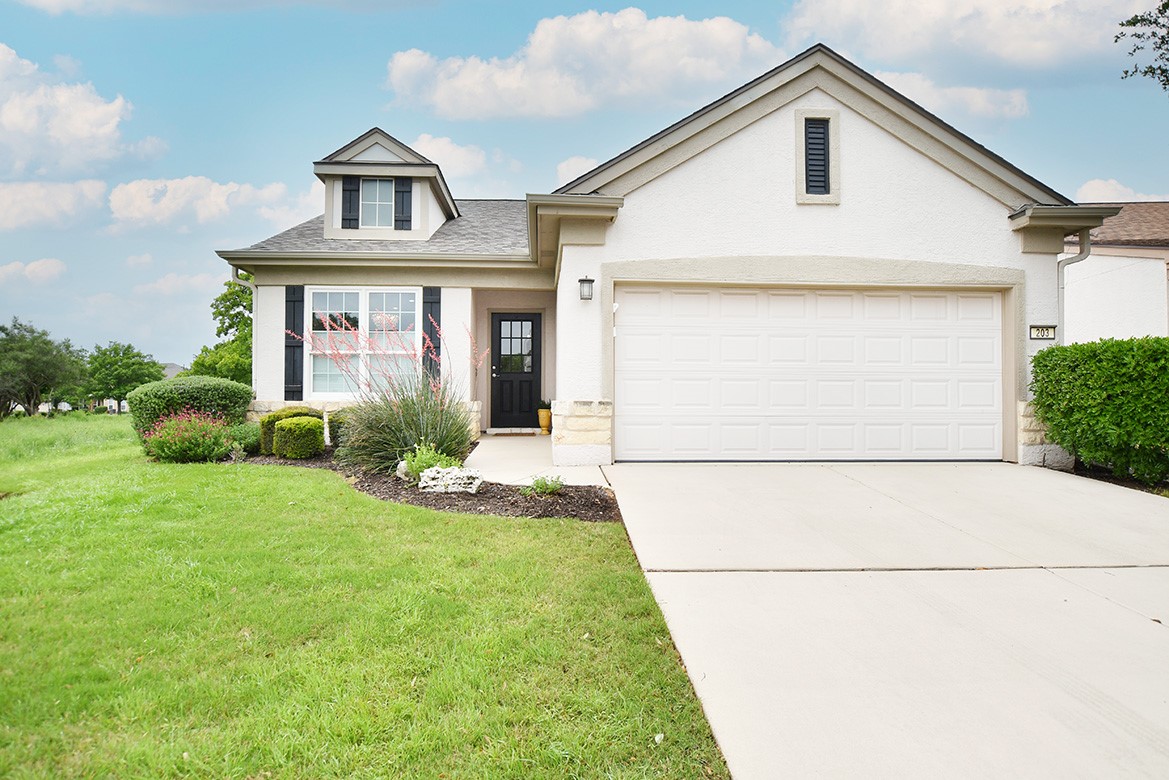203 Winter Drive Georgetown, TX 78633 - Photo 1 of 29 Convenience of location makes access in and out of the Sun City community quick and easy from this landscape maintained Bayberry plan, where the yard work is left to someone else for the stated dues.