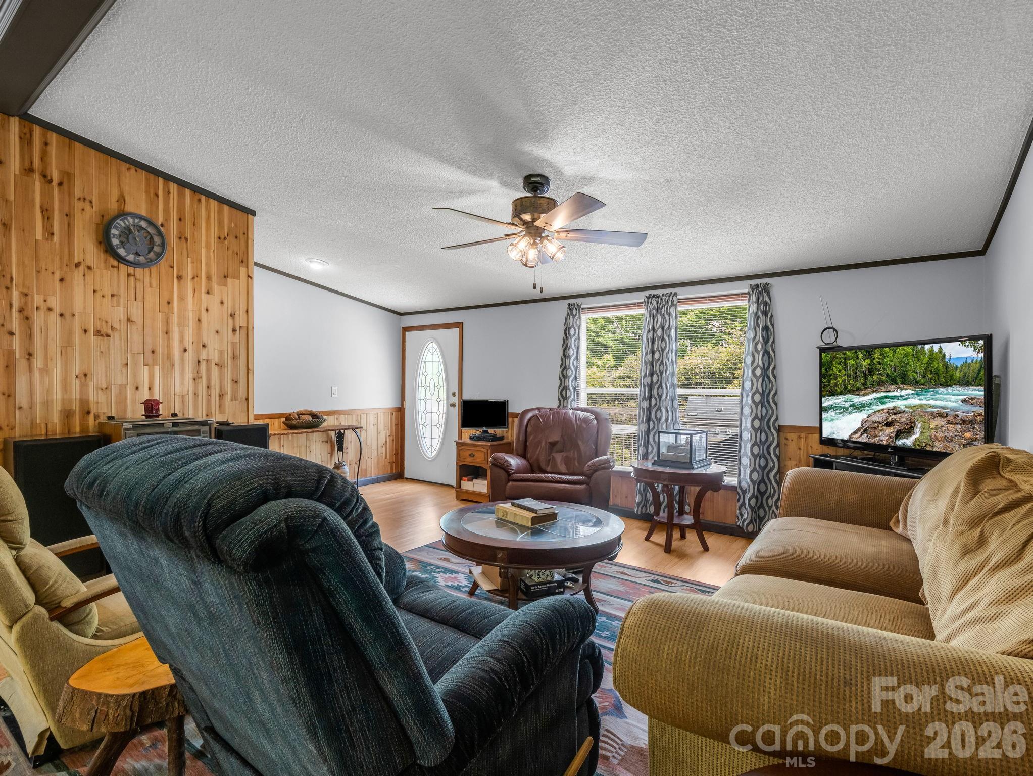 2053 Nancy Mountain Road Rosman, NC 28772 - Photo 14 of 47 a living room with furniture and a large window