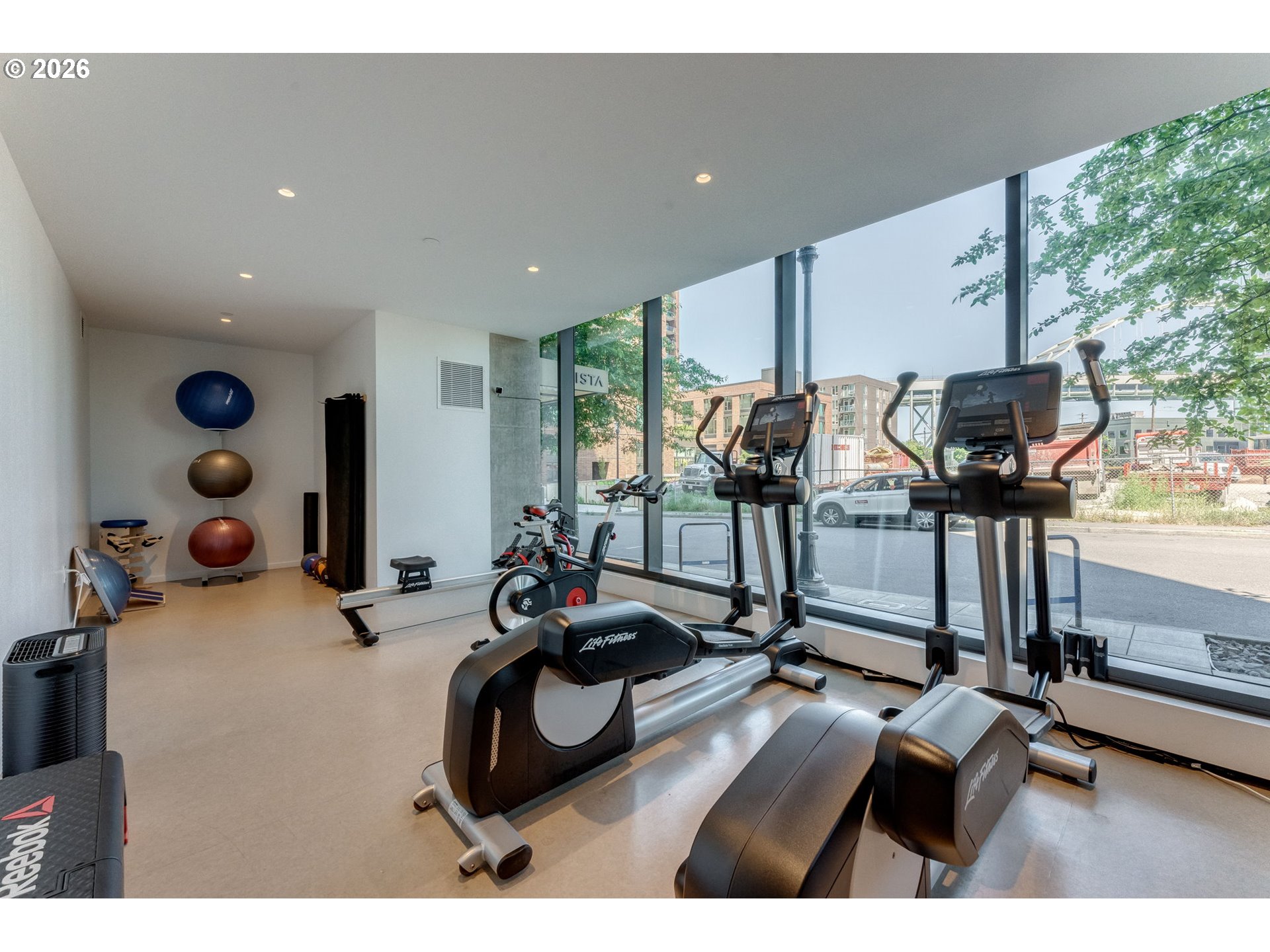 1150 Northwest Quimby Street, Unit 406 Portland, OR 97209 - Photo 27 of 48 a view of a room with gym equipment
