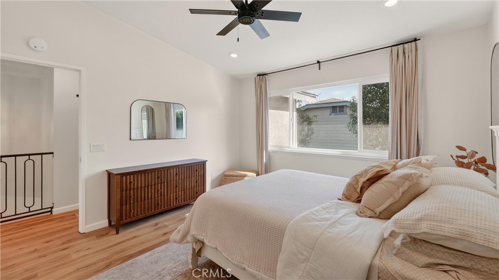 1761 Forum Way, Unit D Corona, CA 92881 - Photo 20 of 39 a bedroom with a bed and a window