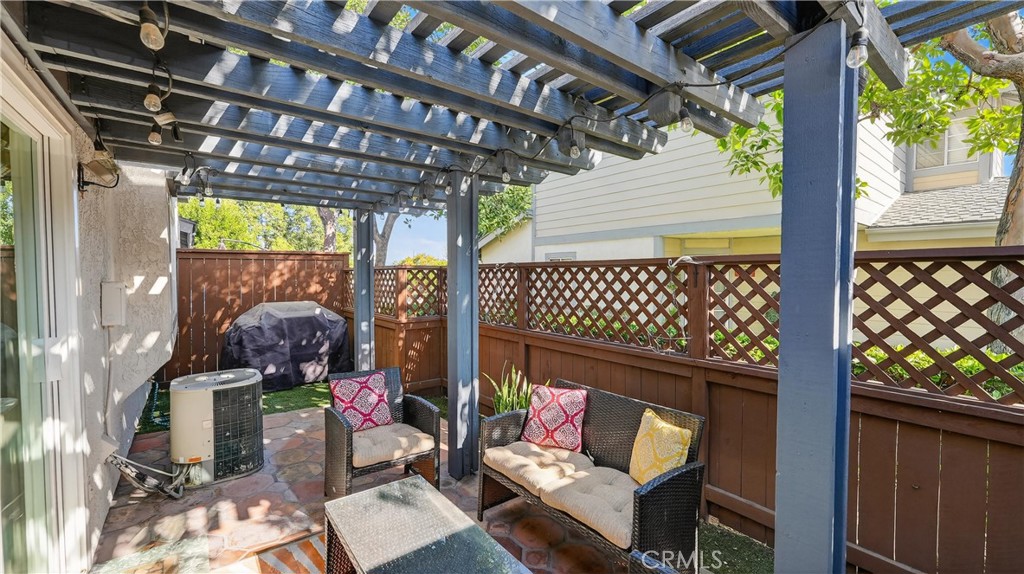 1761 Forum Way, Unit D Corona, CA 92881 - Photo 27 of 39 a outdoor living space with furniture