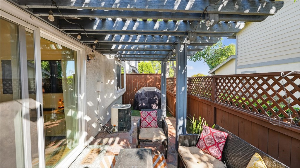 1761 Forum Way, Unit D Corona, CA 92881 - Photo 28 of 39 a view of a chairs and table in the balcony