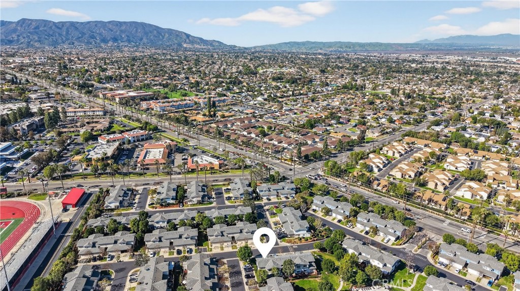 1761 Forum Way, Unit D Corona, CA 92881 - Photo 36 of 39 an aerial view of residential houses with city view