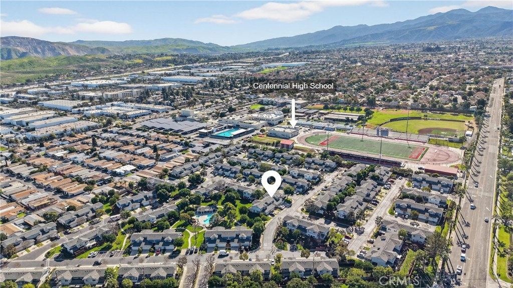 1761 Forum Way, Unit D Corona, CA 92881 - Photo 38 of 39 an aerial view of a residential houses and city view