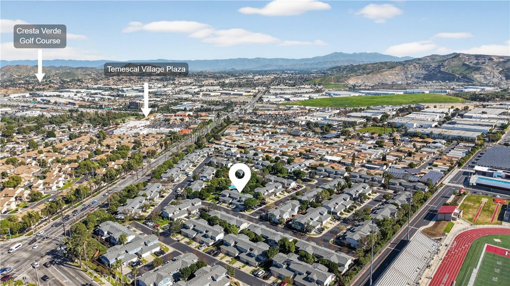 1761 Forum Way, Unit D Corona, CA 92881 - Photo 39 of 39 an aerial view of residential houses with outdoor space