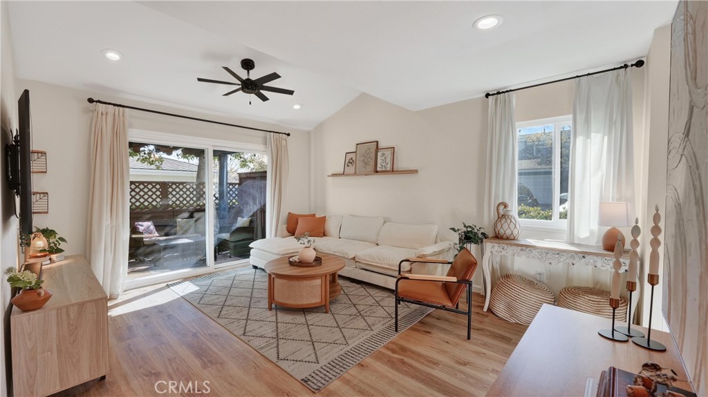 1761 Forum Way, Unit D Corona, CA 92881 - Photo 4 of 39 a living room with furniture and a large window