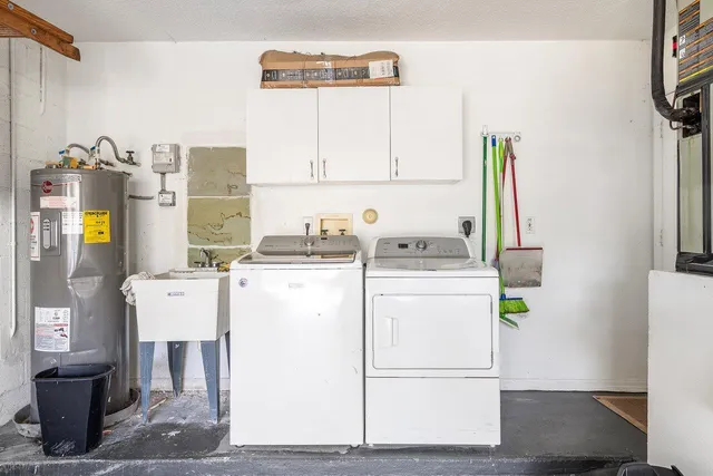 a view of a backyard with sitting area