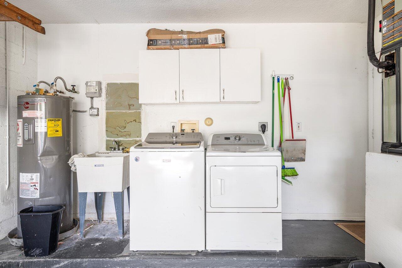 177 Heming Way Boynton Beach, FL 33426 - Photo 19 of 22 a utility room with dryer and washer