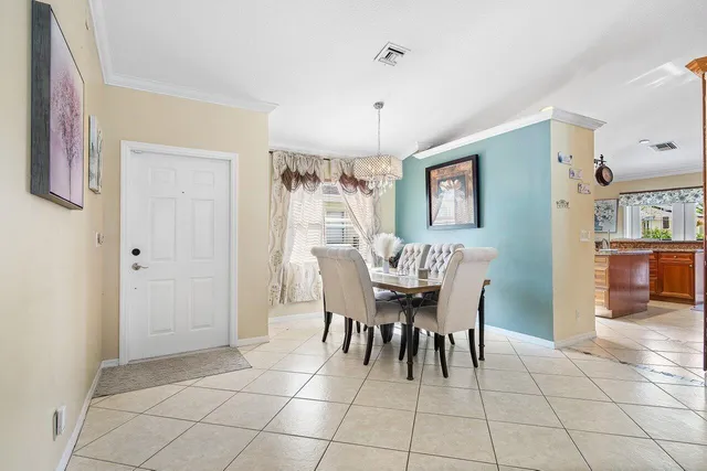 a dining room well furnished