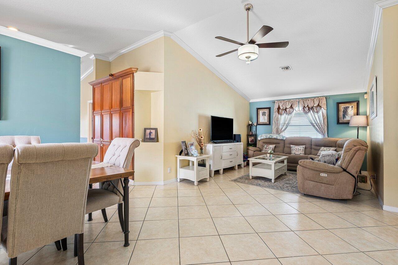 177 Heming Way Boynton Beach, FL 33426 - Photo 10 of 22 a living room with furniture and a flat screen tv
