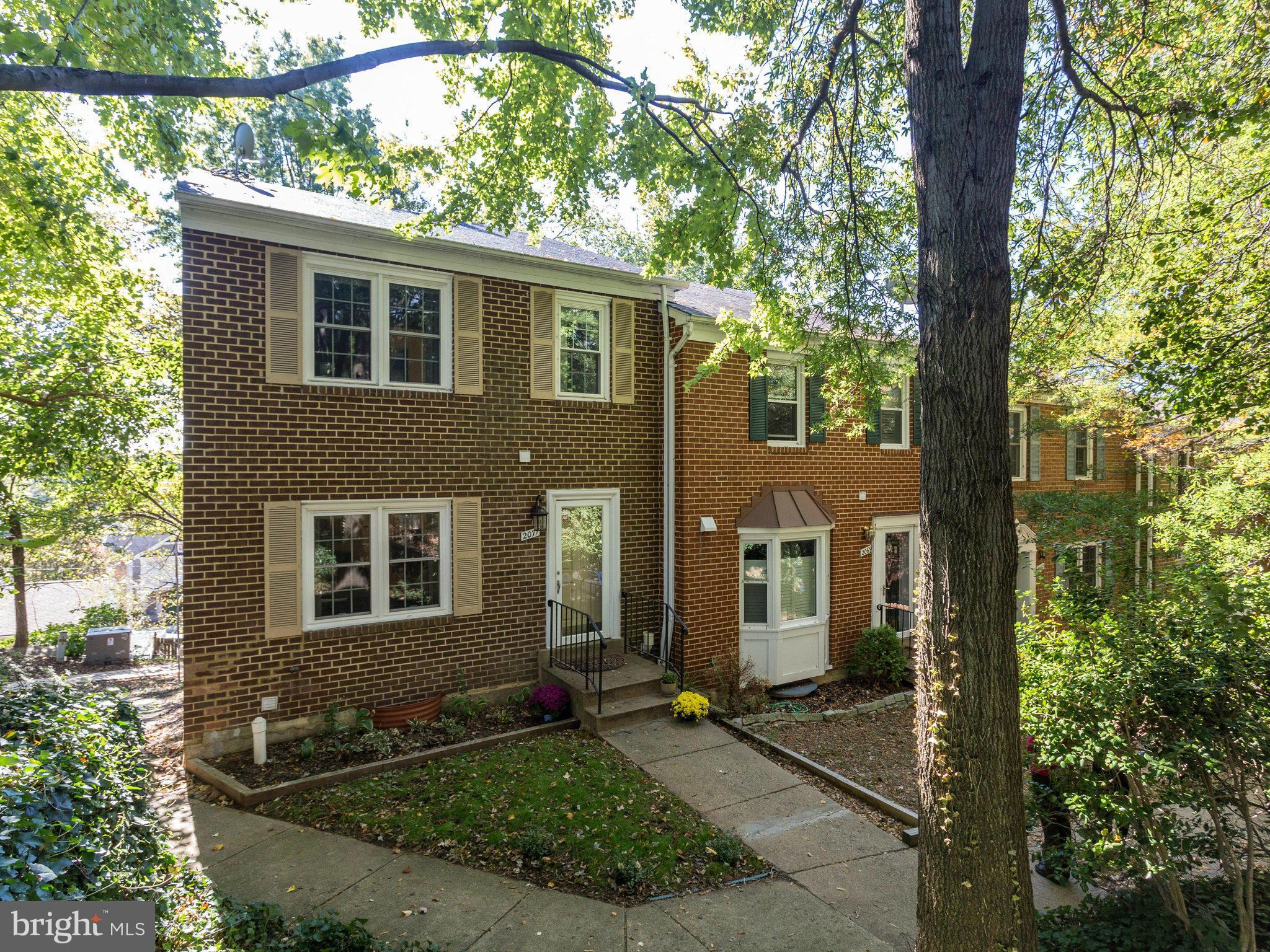 2071 South Glebe Road Arlington, VA 22206 - Photo 1 of 19 a front view of a house with yard