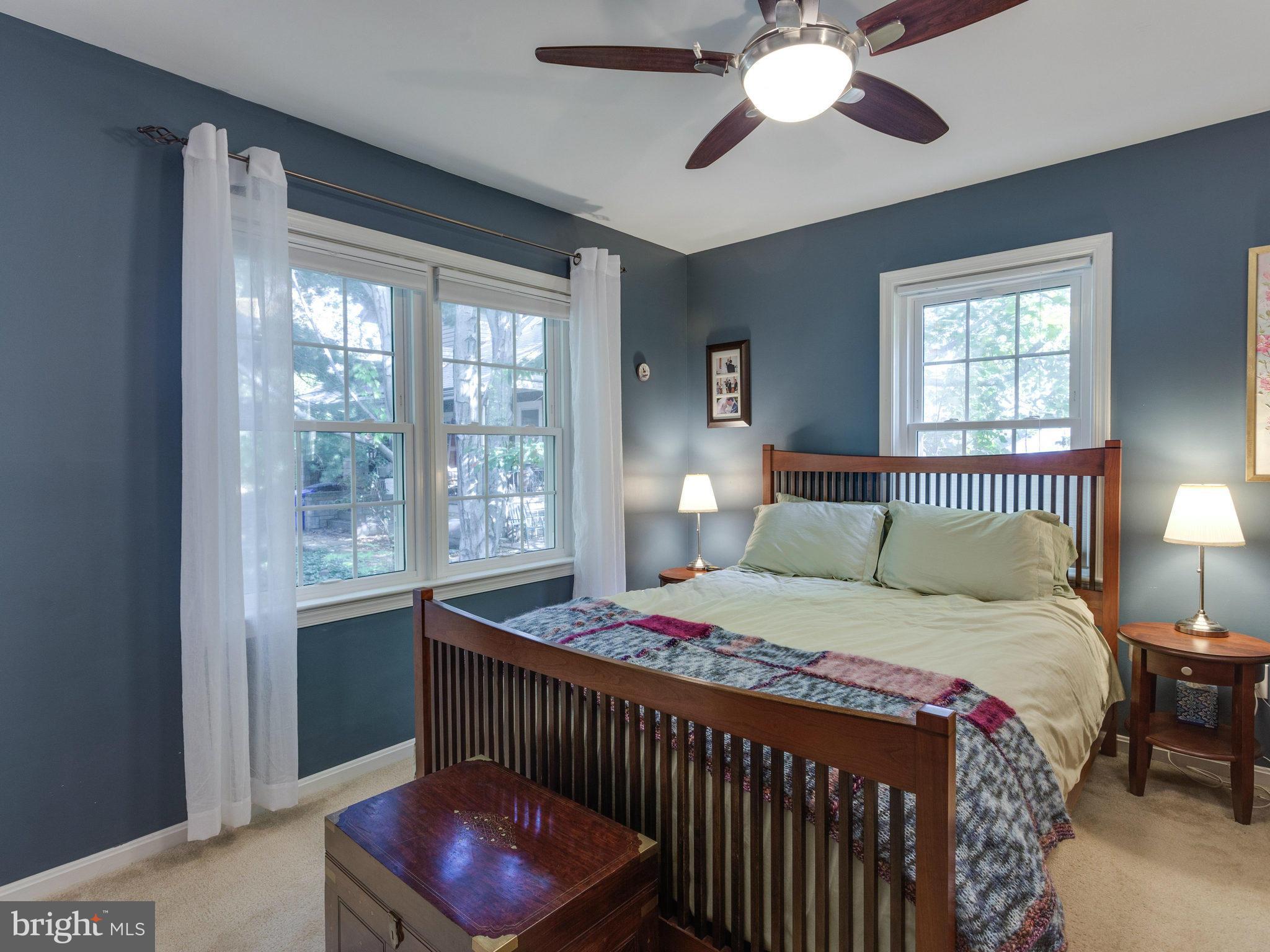 2071 South Glebe Road Arlington, VA 22206 - Photo 10 of 19 a bedroom with a bed and a chandelier