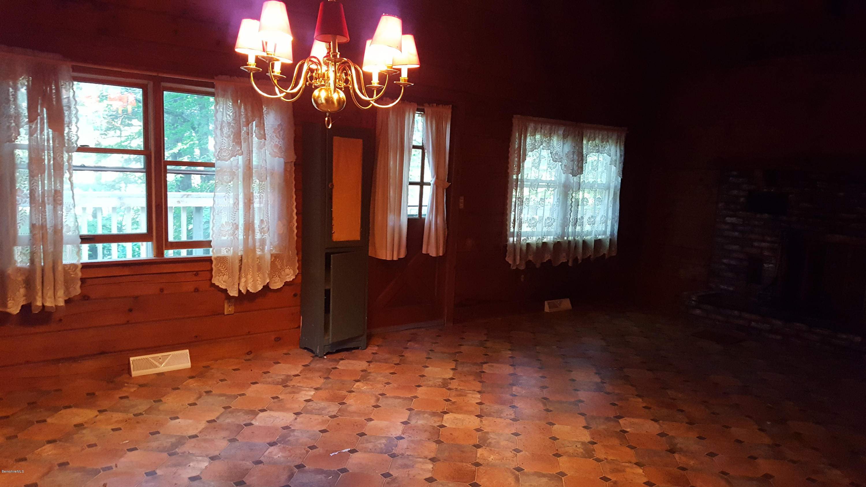 514 South Main Road Otis, MA 01253 - Photo 12 of 21 a view of an empty room with wooden floor and a window