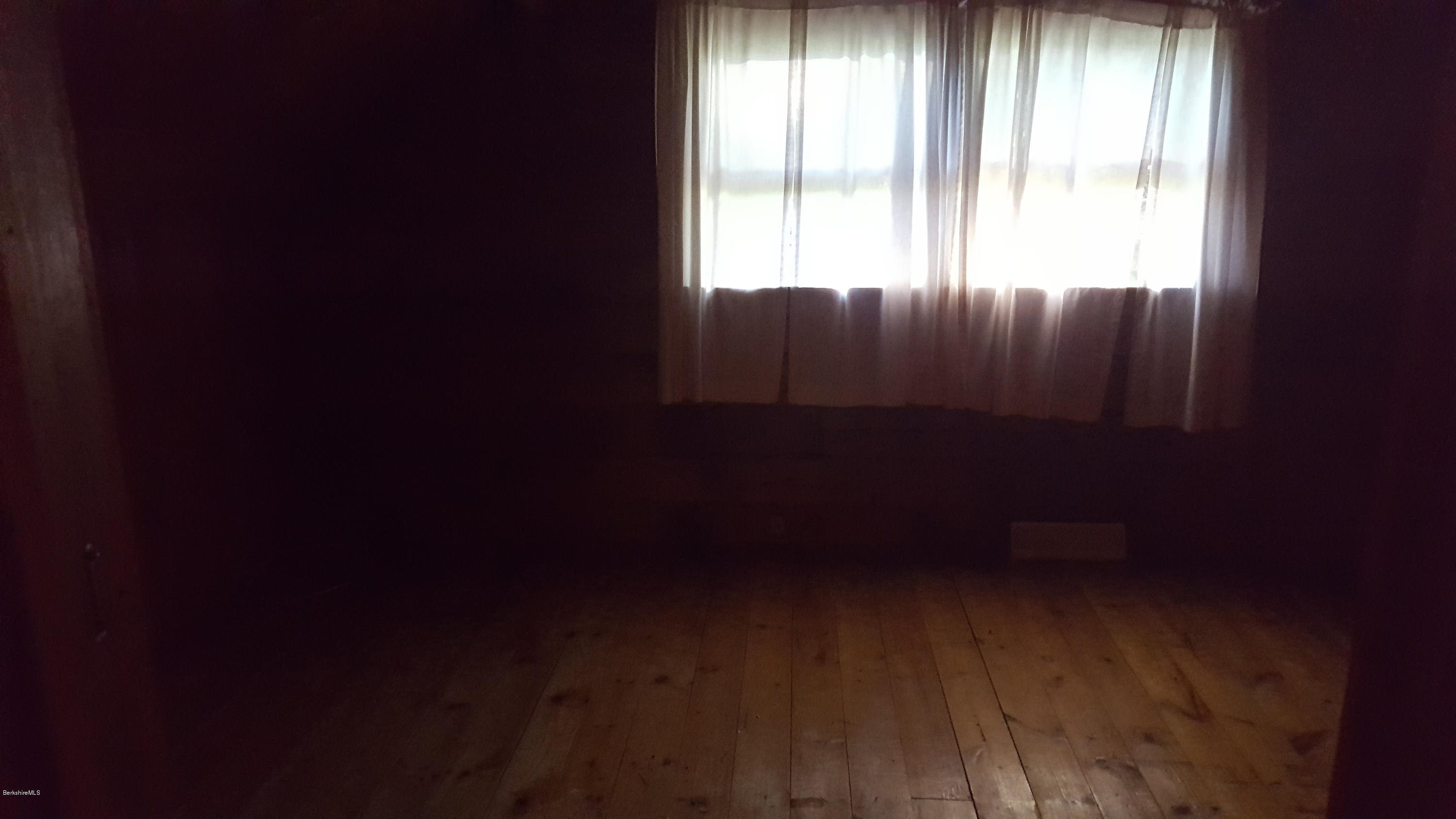 514 South Main Road Otis, MA 01253 - Photo 16 of 21 a view of an empty room with a window