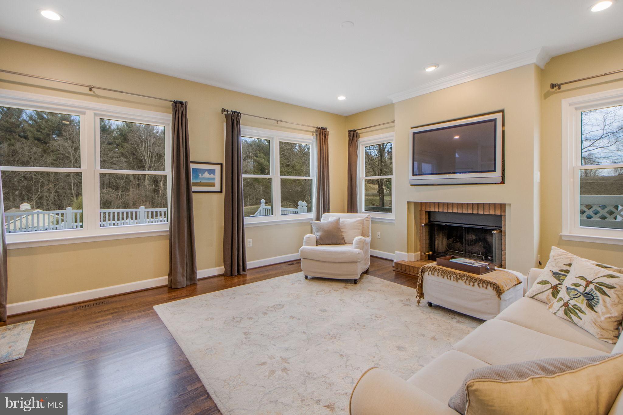 15434 Conrad Spring Road Boyds, MD 20841 - Photo 33 of 150 Family room off kitchen w/ gas fireplace