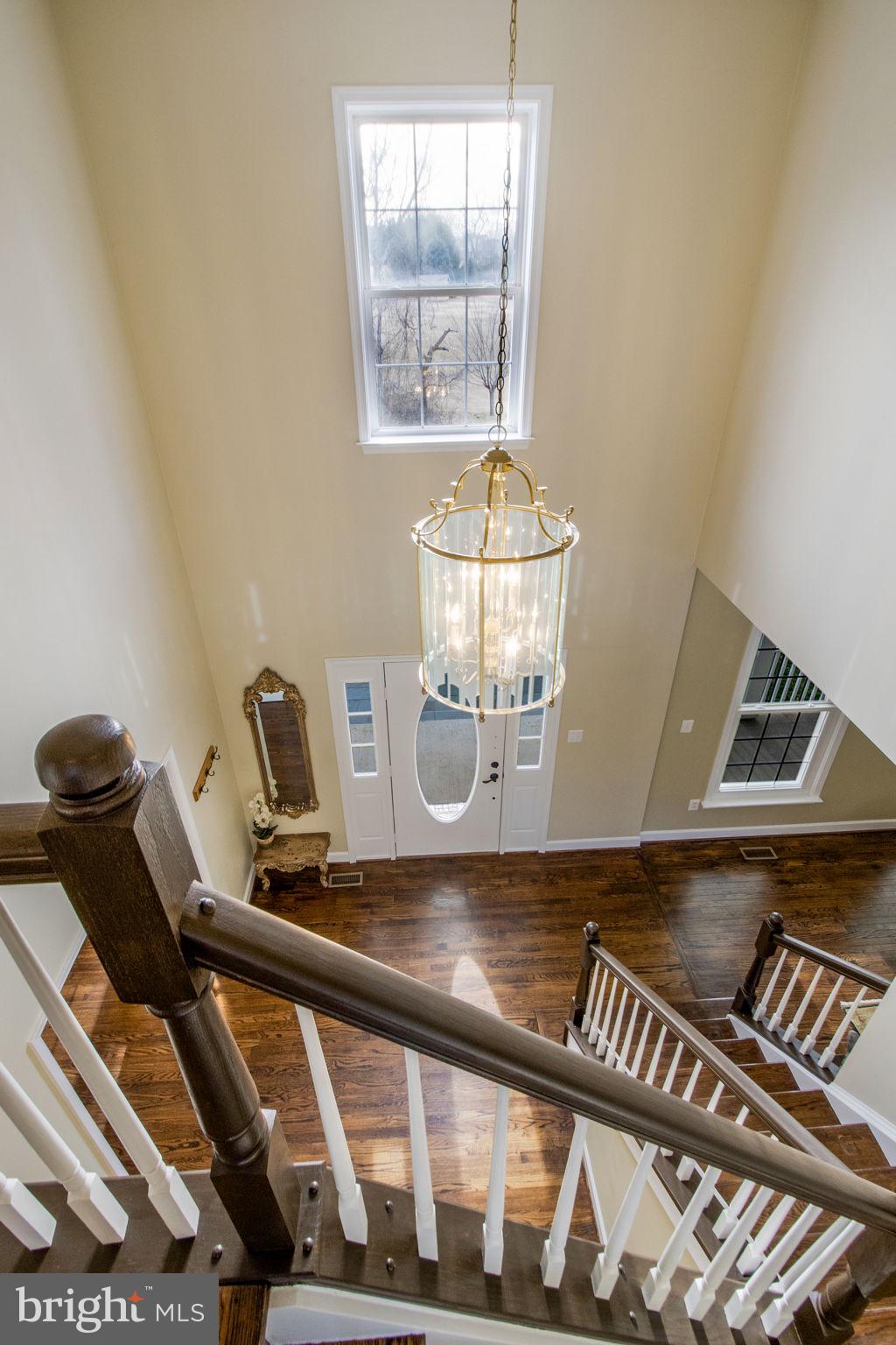 15434 Conrad Spring Road Boyds, MD 20841 - Photo 56 of 150 Upper level hallway w/view of entry foyer