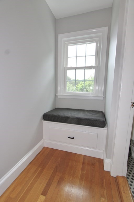 16 Thorndyke Road Worcester, MA 01606 - Photo 13 of 17 an empty room with wooden floor and window