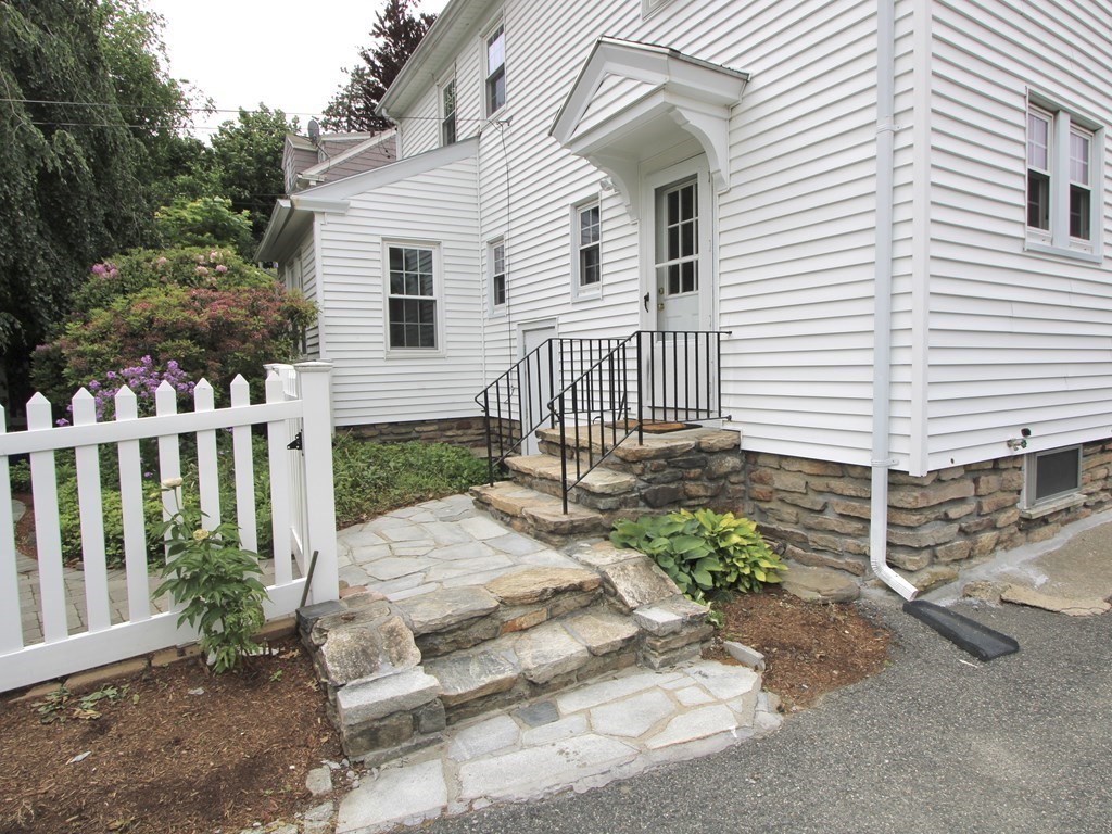 16 Thorndyke Road Worcester, MA 01606 - Photo 16 of 17 a front view of a house with a yard