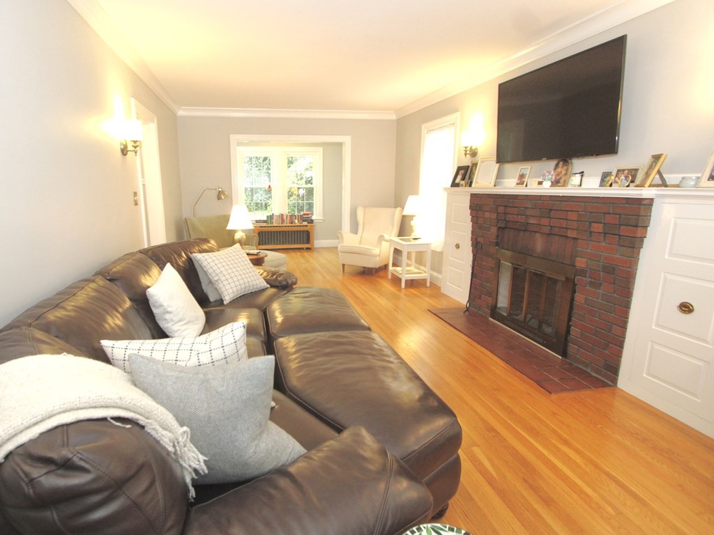 16 Thorndyke Road Worcester, MA 01606 - Photo 3 of 17 a living room with furniture and a flat screen tv