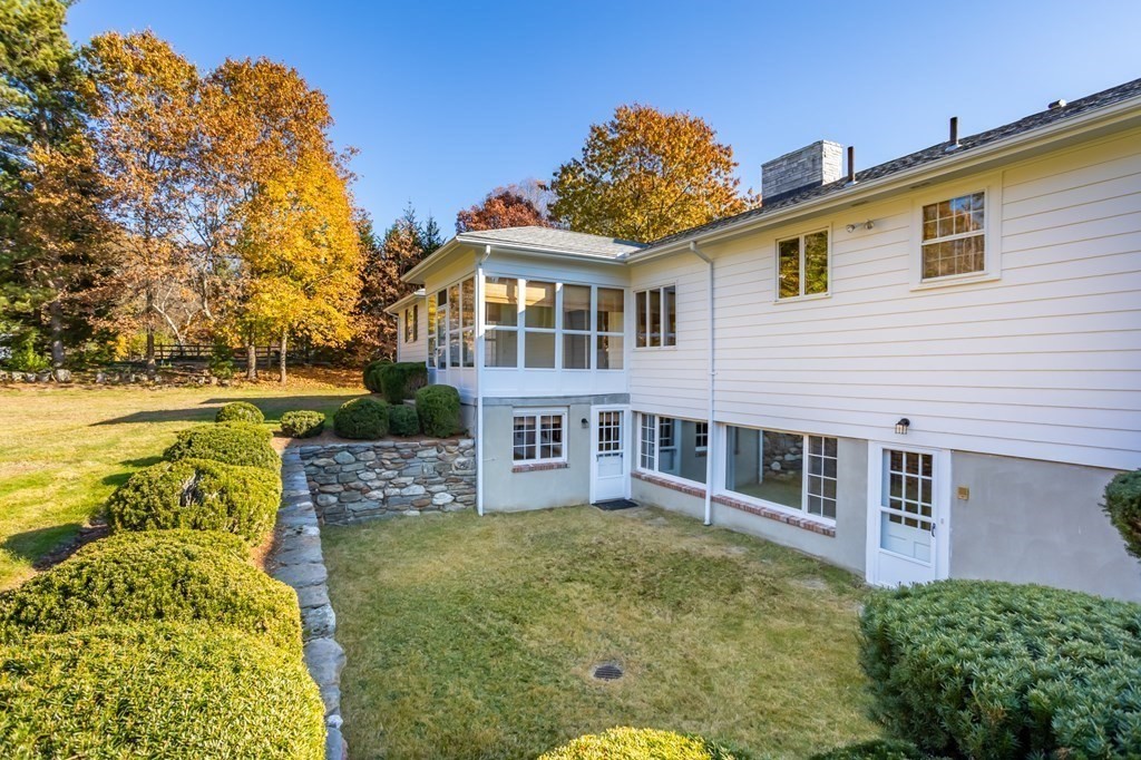263 Lincoln Road Lincoln, MA 01773 - Photo 35 of 37 a front view of a house with a big yard