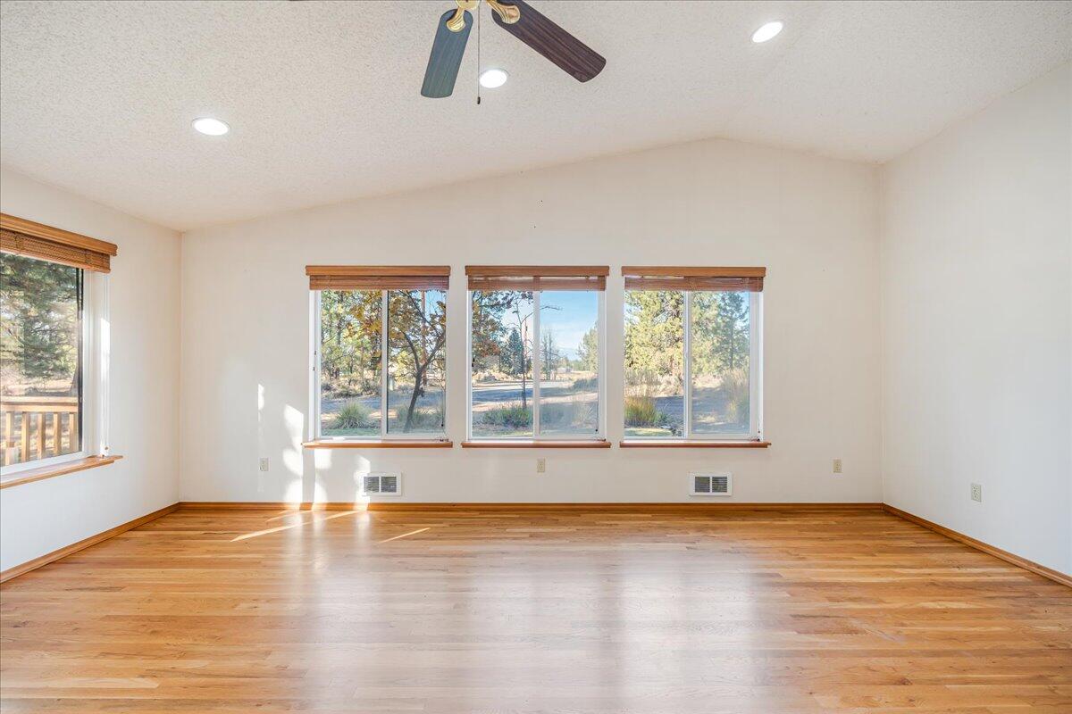 19304 Baker Road Bend, OR 97702 - Photo 6 of 38 Your second living room has a vaulted ceiling and oak hardwood flooring