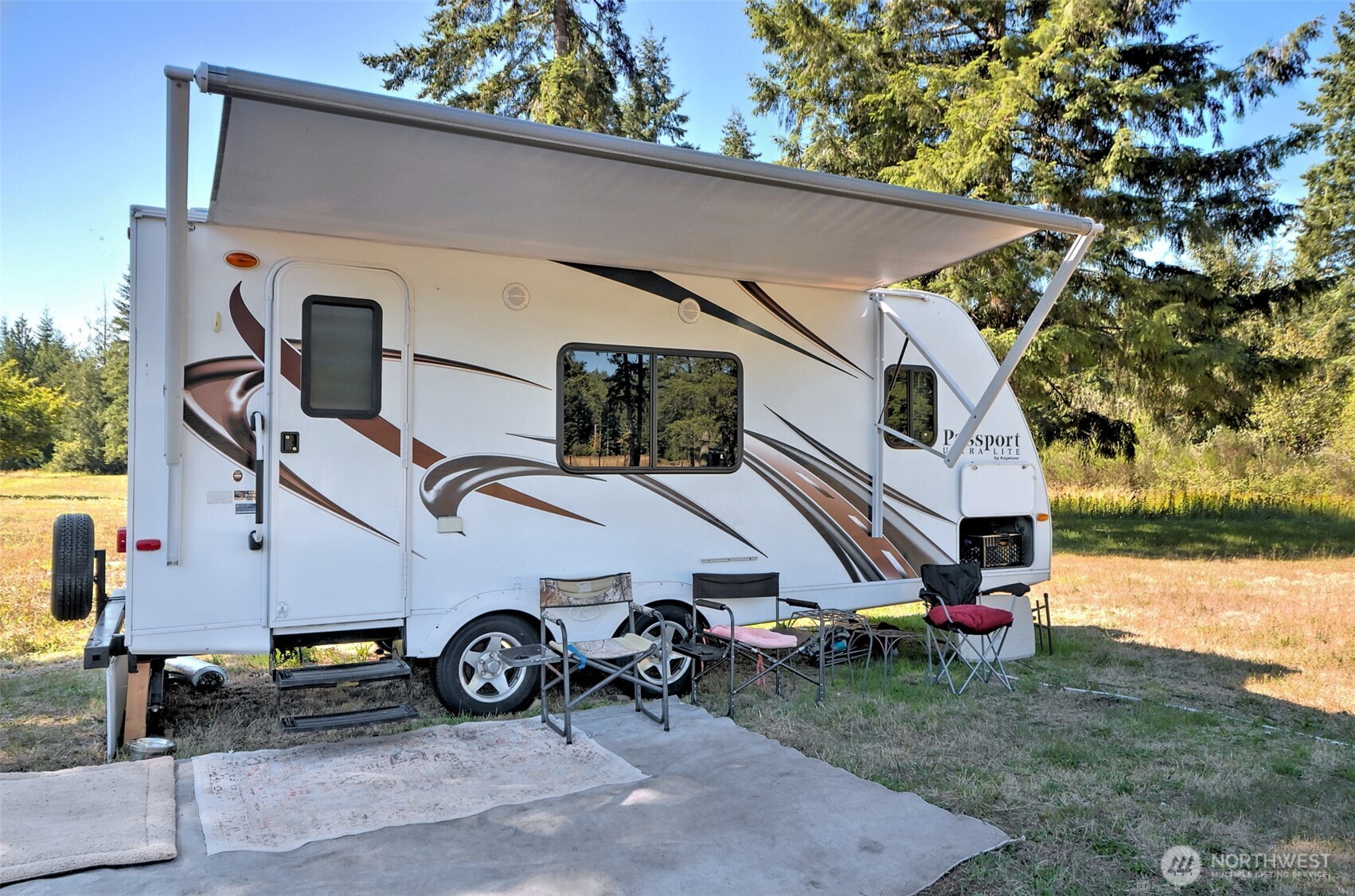 1982 West Ford Loop Road Elma, WA 98541 - Photo 15 of 29 a view of a car in front of a house