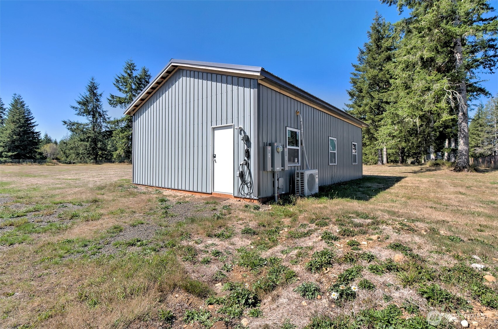 1982 West Ford Loop Road Elma, WA 98541 - Photo 7 of 29 a view of a house with a yard