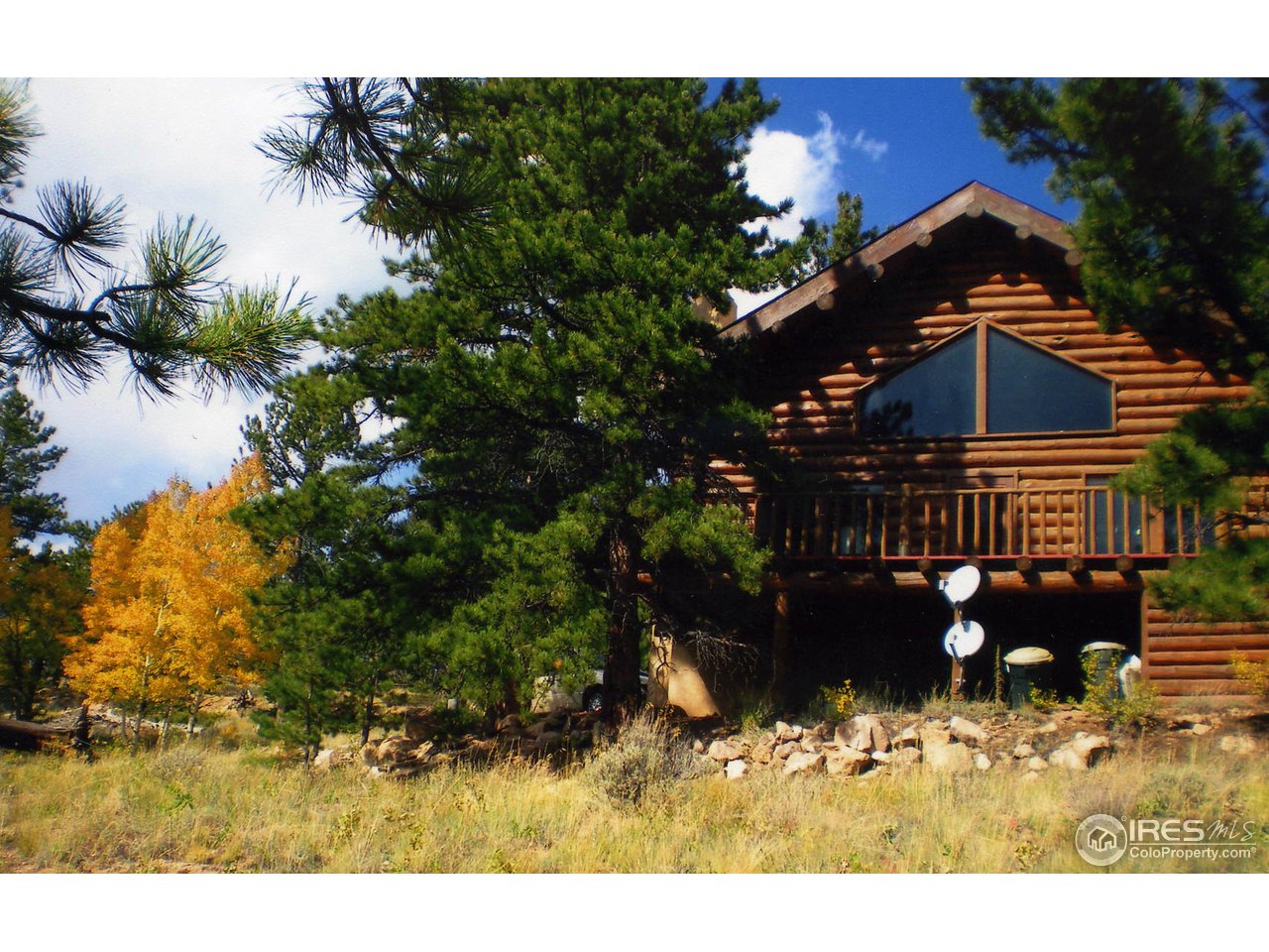 235 Swift Deer Road Red Feather Lakes, CO 80545 - Photo 1 of 18 Hand hewn log home
