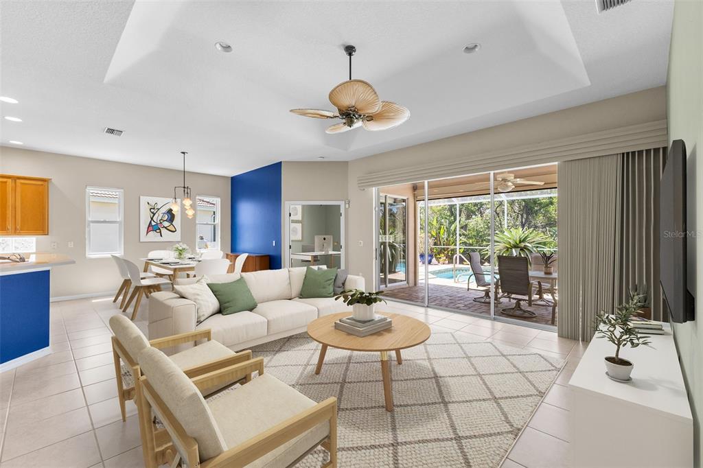 6532 Copper Ridge Trail Bradenton, FL 34201 - Photo 11 of 42 Open concept living room/ dining room/ kitchen